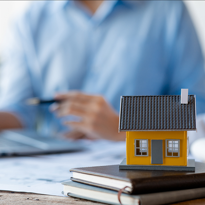 close-up-a-model-of-a-house-is-placed-on-a-table | Honor Home Loans